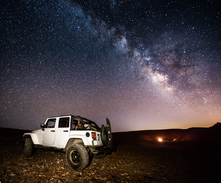 Beautiful landscape of the milky way at night, road trip to mountains, camp on the top of Kornet El...