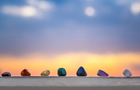 Crystals, energy stones for meditation over sunset