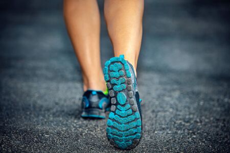 Sporty female on a jog outdoor workout