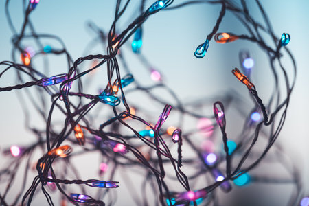 Christmas Mood. Glowing Festoon and Mild Golden Lights. Christmas Background. New Year Party. Modern Holiday Backgroundの写真素材