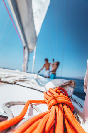 Two guys working on sailboatの写真素材