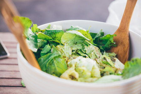 Fresh tasty green salad for lunchの写真素材