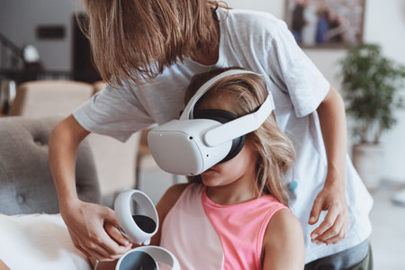 Brother and Sister Playing Video Gameの写真素材