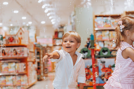 Happy Children Blowing Soap Bubblesの写真素材