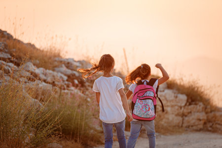 Happy Teen Girls in the Mountainsの写真素材