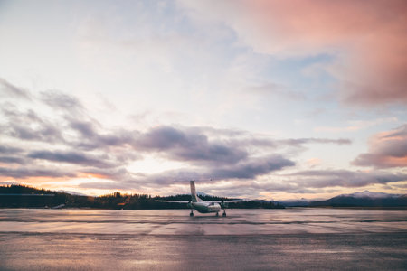 Airplane is Positioned on the Runway, Awaiting Take offの写真素材