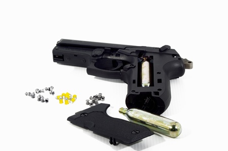 Black steel air pistol isolated on white 