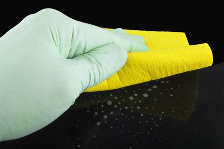 sponge and powders on the black table