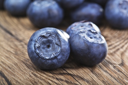 blueberries close up on a wood tableの写真素材