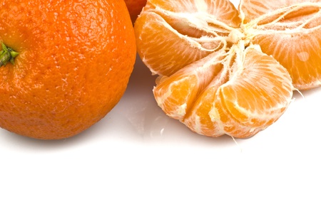  tangerines and slices on white background の写真素材