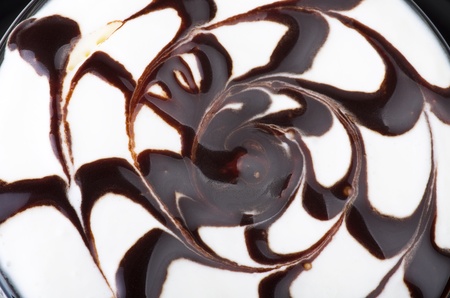 Hot chocolate art close up on the whiteの写真素材