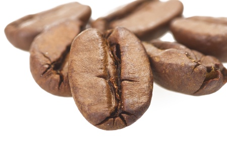 Coffee beans close up on the white の写真素材