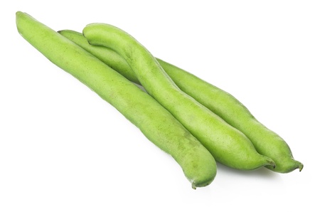 Fresh broad beans and pods close up on whiteの写真素材
