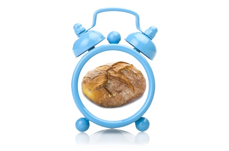 Old blue alarm clock concept close up on white の写真素材