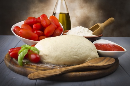 tomato basil flour olive oil for homemade pizzaの写真素材