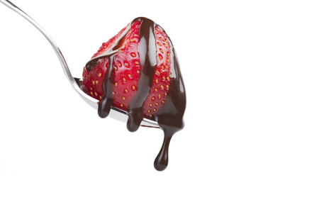 Fresh Strawberry on spoon on the whiteの写真素材