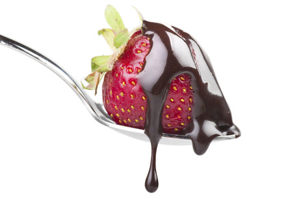 Fresh Strawberry on spoon on the whiteの写真素材