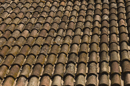 old roof tiles of a house in the castle of Gradara