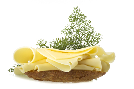 Swiss cheese slices close up on the whiteの写真素材