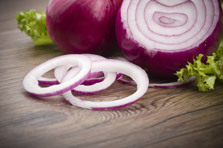 Red Onion rings close up on the  tableの写真素材
