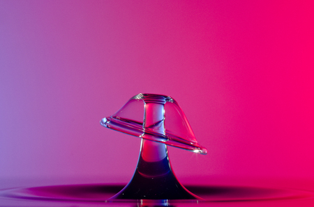 Splash of colored water drops close upの写真素材