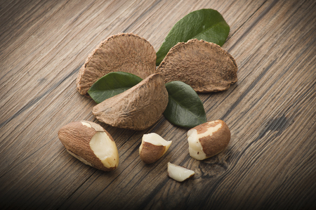 Brazil walnut close up on the wood tableの写真素材