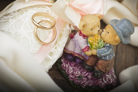 Wedding Rings with Wedding Decoration on the woodの写真素材