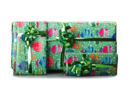 Big giftbox bounded with green ribbon on whiteの写真素材