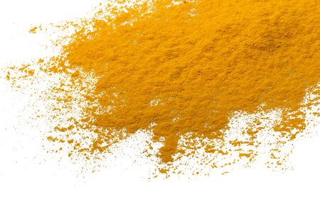 dust of ground turmeric on the white の写真素材