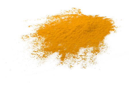 dust of ground turmeric on the white の写真素材