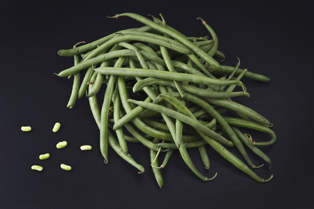 Group of fresh green bean on slate stone plateの写真素材
