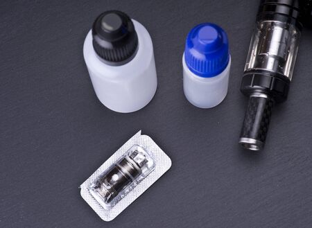 modern vaporizer boxmod e-cig device on grey backgroundの写真素材