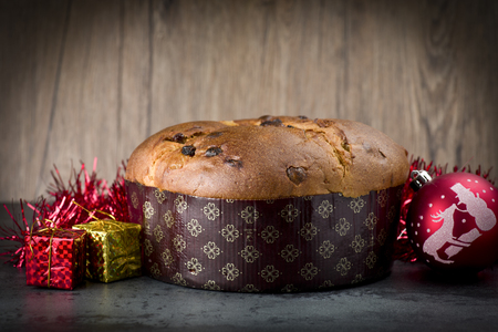 Panettone, sweet typical Italian Christmas on holiday backgroundの写真素材