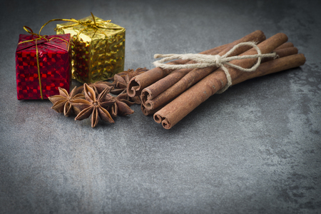 Star anise,cinnamon and licorice on grey backgroundの写真素材