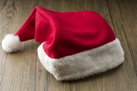 Santa Claus red hat on the wood background
の写真素材