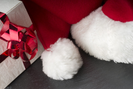 Santa Claus red hat on the wood background
の写真素材