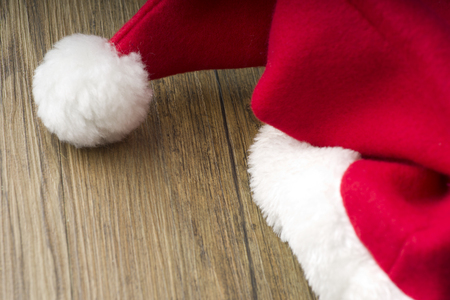 Santa Claus red hat on the wood background
の写真素材
