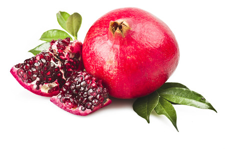 ripe pomegranate fruit and its grains on white backgroundの写真素材