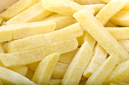 group of frozen chips ready to be friedの写真素材