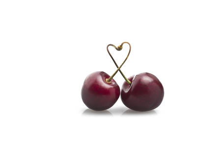 Fresh cherry close up on the whiteの写真素材