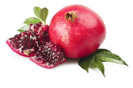 ripe pomegranate fruit and its grains on white backgroundの写真素材