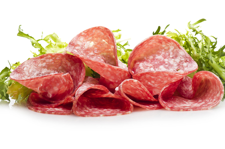 Salami sliced and bread with lattuce on whiteの写真素材