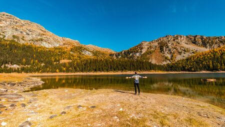 Lake Palu 'Italy Valmalenco Sondrio first days of autumnの写真素材