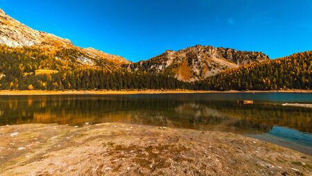 Lake Palu 'Italy Valmalenco Sondrio first days of autumnの写真素材