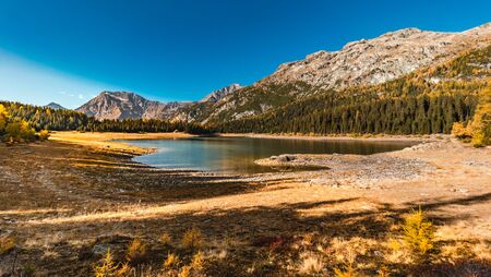Lake Palu 'Italy Valmalenco Sondrio first days of autumnの写真素材