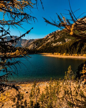 Lake Palu 'Italy Valmalenco Sondrio first days of autumnの写真素材