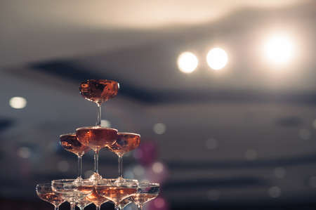 small tower of champagne's glass in wedding reception partyの写真素材
