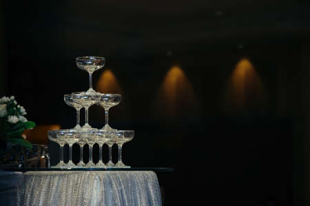 small tower of champagne's glass in wedding reception partyの写真素材