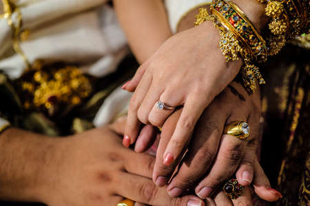 pouring holy water in thai weddingの写真素材
