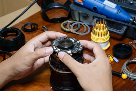 repairing my lensの写真素材
